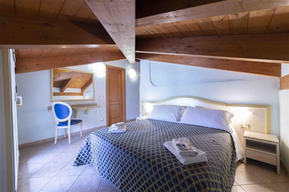 Residenza Melucci Aparthotel Римини Стая снимка